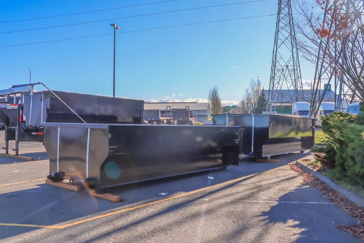 Roll-off dumpster ready for waste disposal at job site for Cleanout Dumpster Rental in Portage